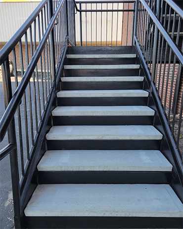 Custom designed wrought iron railing for staircase in Atlanta