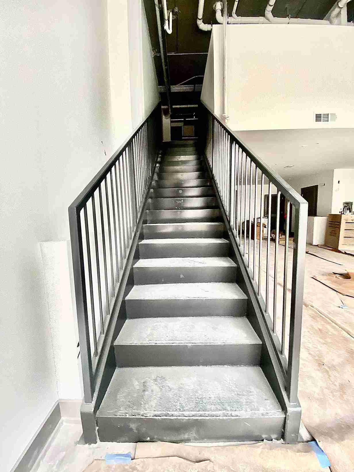 Sleek and modern metal staircase design, perfect for urban style homes