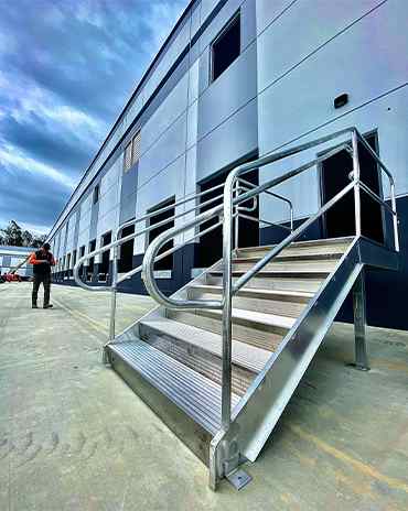Sleek metal staircase with modern handrails and open risers for a contemporary aesthetic