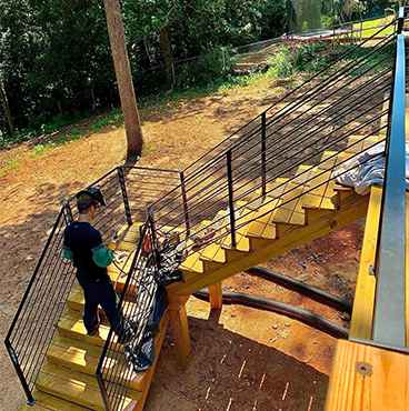 Atlanta welding team repairing damaged metal stairs for safe and long-lasting use