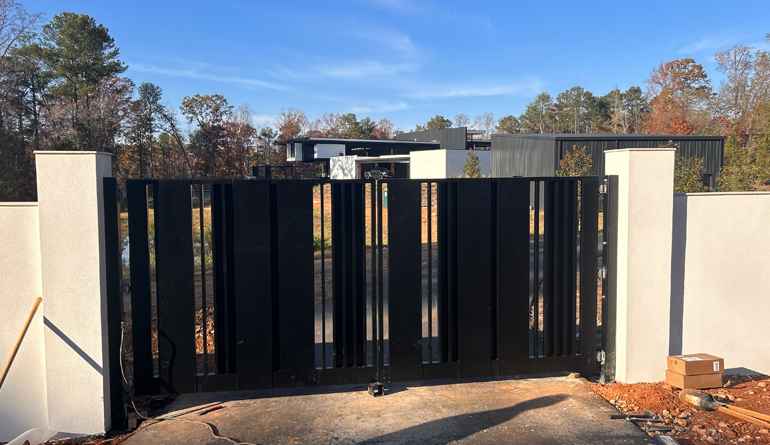 Custom high-end metal entryway gate designed and installed by Atlanta welding experts