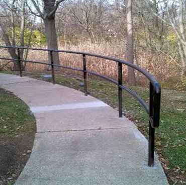 Elegant custom metal stair railing by Atlanta welders for residential safety and design